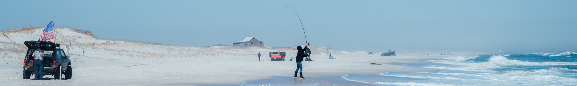Beach driving vehicle with 2024 permit displayed on windshield showing state regulations compliance