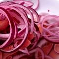 thinly sliced red onion