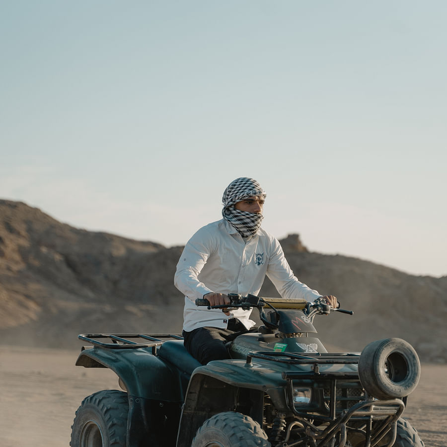4x4 vehicle driving on a stunning beach